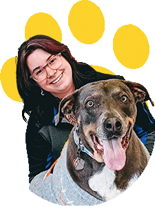 smiling woman with brown dog